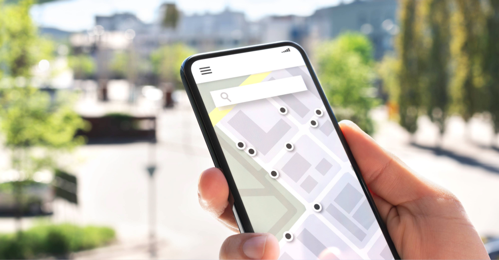 smartphone showing map interface representing Google Maps AI and local search for contractors
